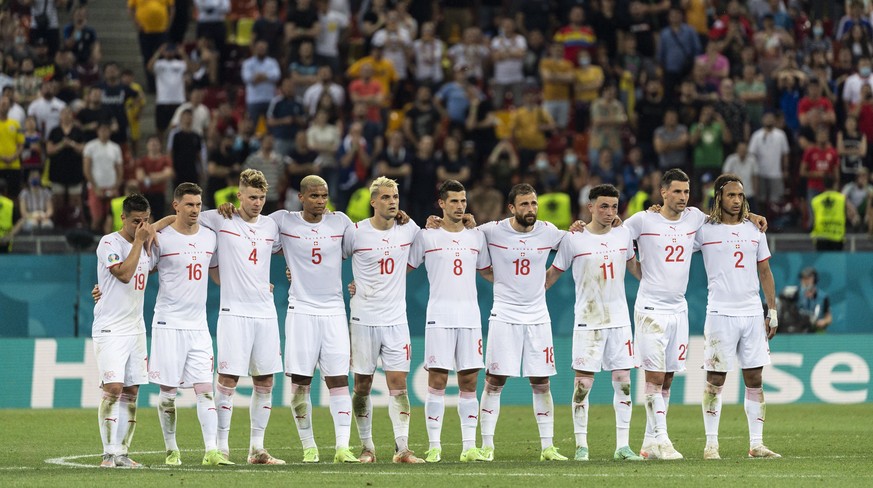 epa09309671 Players of Switzerland react during the penalty shootout of the UEFA EURO 2020 round of 16 soccer match between France and Switzerland in Bucharest, Romania, 28 June 2021. EPA/JEAN-CHRISTO ...