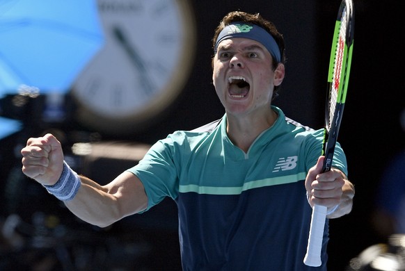 Canada&#039;s Milos Raonic celebrates after defeating Germany&#039;s Alexander Zverev in their fourth round match at the Australian Open tennis championships in Melbourne, Australia, Monday, Jan. 21,  ...