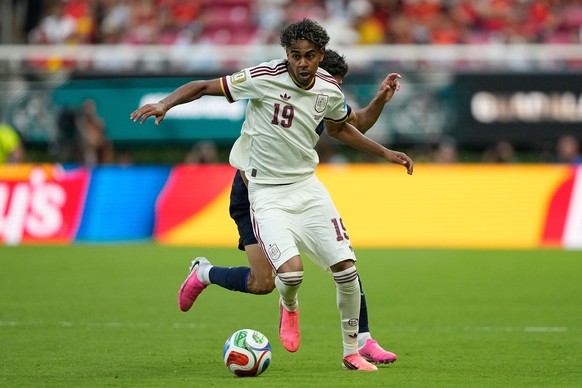 Spain's Lamine Yamal runs with the ball during the World Cup Group H soccer match between Uruguay and Spain in Zapopan, near Guadalajara, Mexico, Friday, June 26, 2026. (AP Photo/Natacha Pisarenk ...