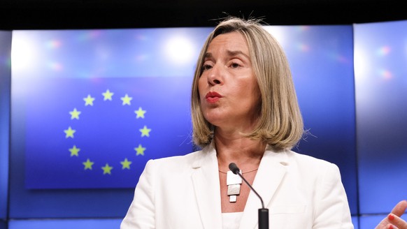 epa06738540 European Union Foreign Policy Chief Federica Mogherini reacts to Question on Iran Nuclear deal, during a news conference in Brussels, Belgium, 15 May 2018. This evening, High Representativ ...