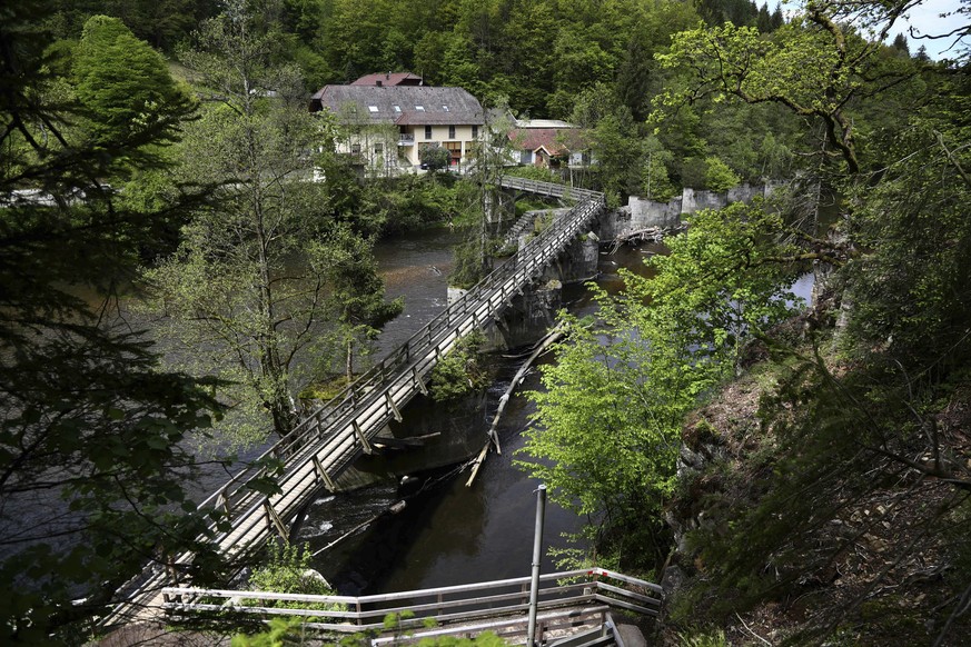 A guesthouse is pictured at the river &#039;Ilz&#039; in Passau, Germany, Monday, May 13, 2019. Police investigating the mysterious death of three people whose bodies were found with crossbow bolts in ...