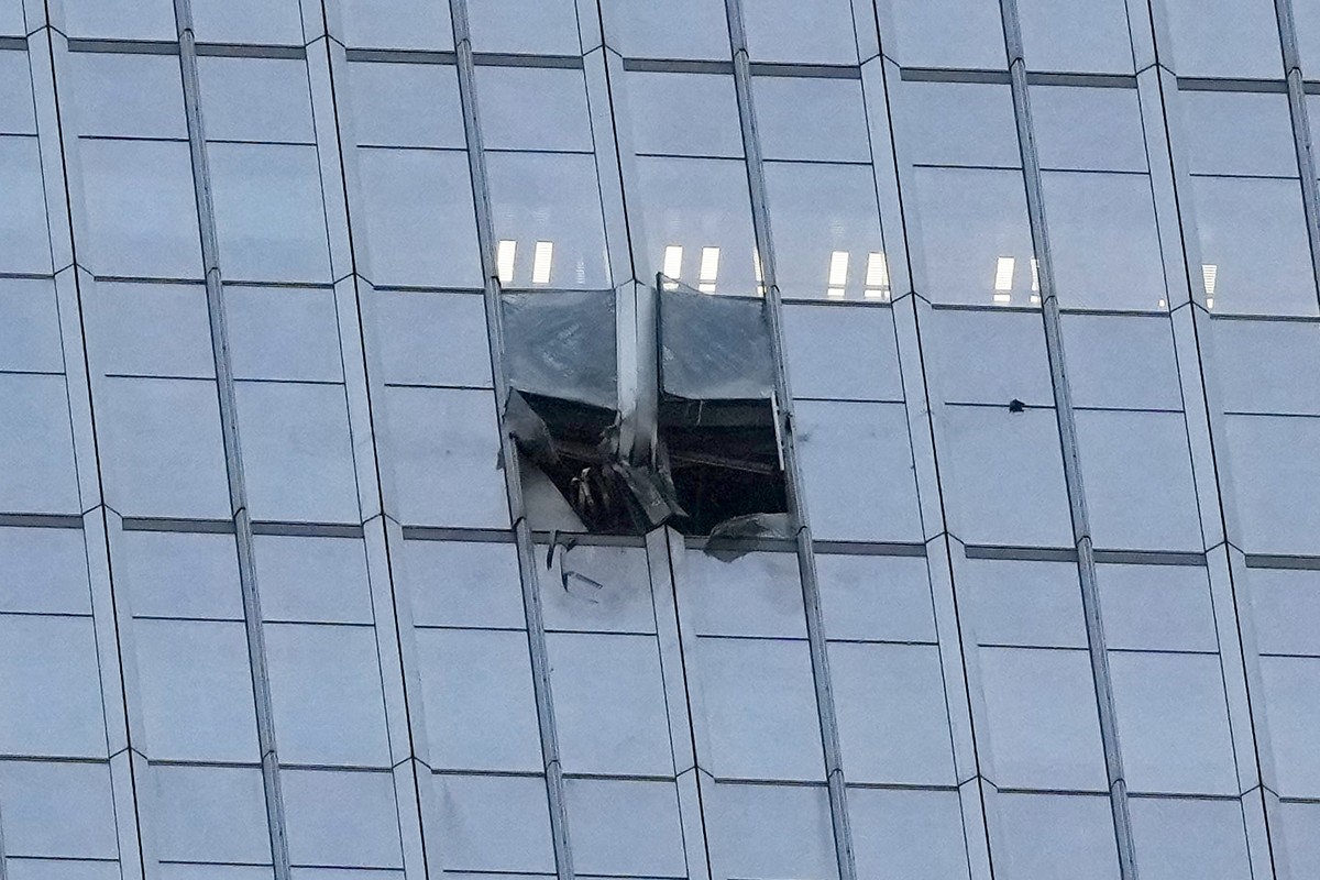 The surface of the Citic Tower also known as Zun Tower is damaged in Beijing, Cina, Friday, June 26, 2026. (AP Photo/Han Guan Ng) Correction: source of the damage removed as it is unknown and name of  ...
