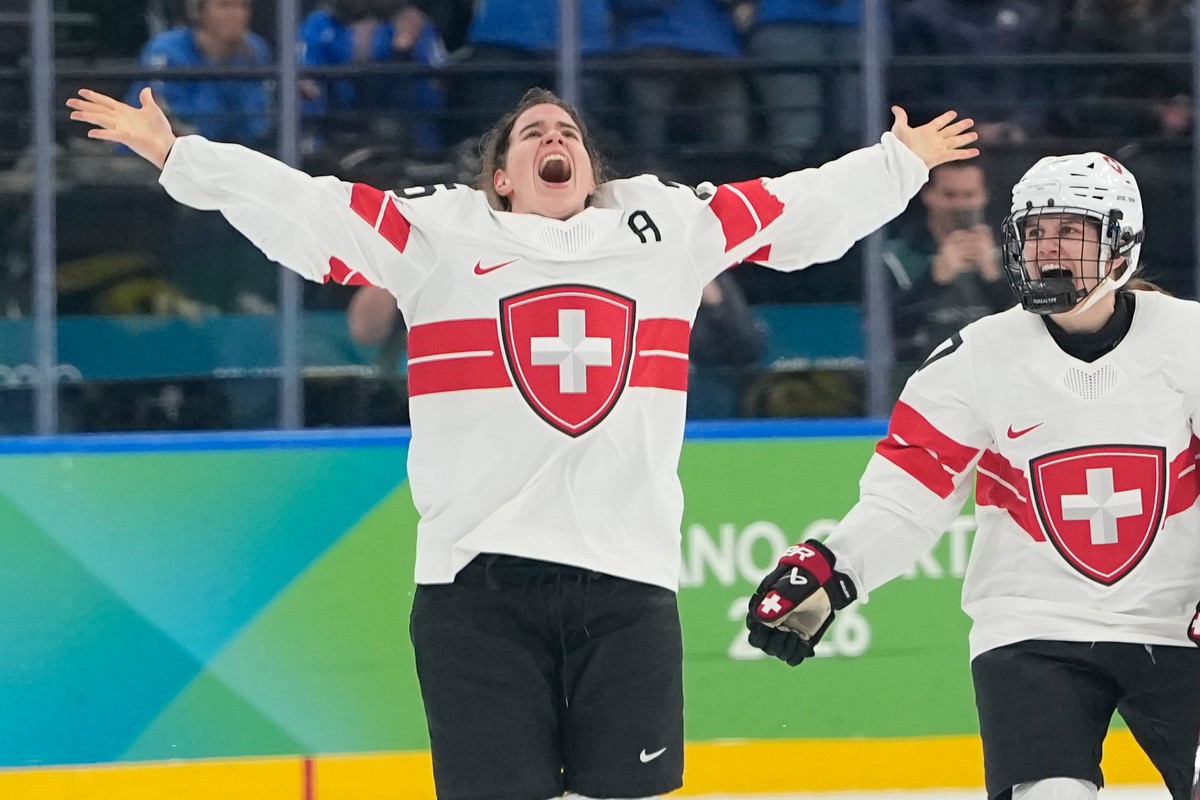 Switzerland's Alina Muller (25) celebrates after a women's ice hockey bronze medal game between Switzerland and Sweden at the 2026 Winter Olympics, in Milan, Italy, Thursday, Feb. 19, 2026.  ...
