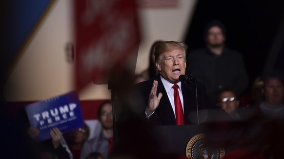 President Donald Trump speaks during a rally at Central Wisconsin Airport in Mosinee, Wis., Wednesday, Oct. 24, 2018. (AP Photo/Susan Walsh)