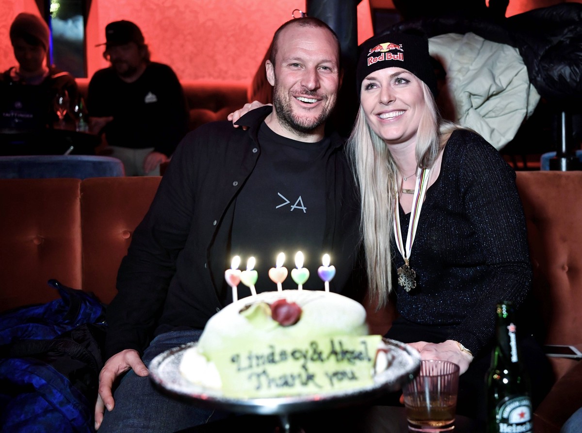 SKIING: FIS World Cup-Schladming Mar 15, 2012 Schladming, AUSTRIA Lindsey Vonn USA, left, and Aksel Lund Svindal NOR on the podium after winning the overall super G titles at the FIS World Cup in Schl ...