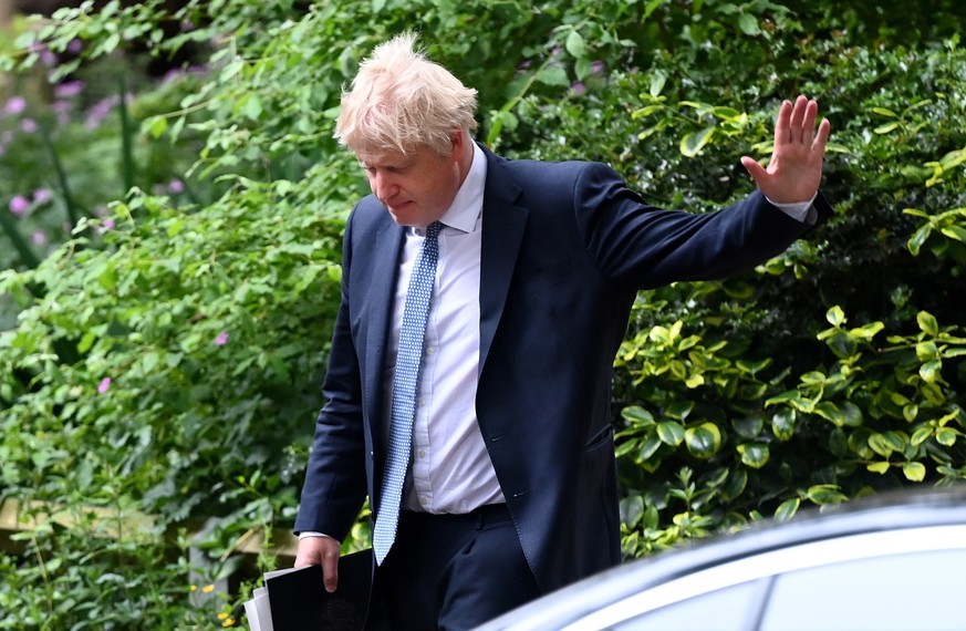 epa09974898 British Prime Minister Boris Johnson gestures to the media following a press conference at 10 Downing Street in London, Britain, 25 May 2022. Johnson is under pressure over &#039;party gat ...
