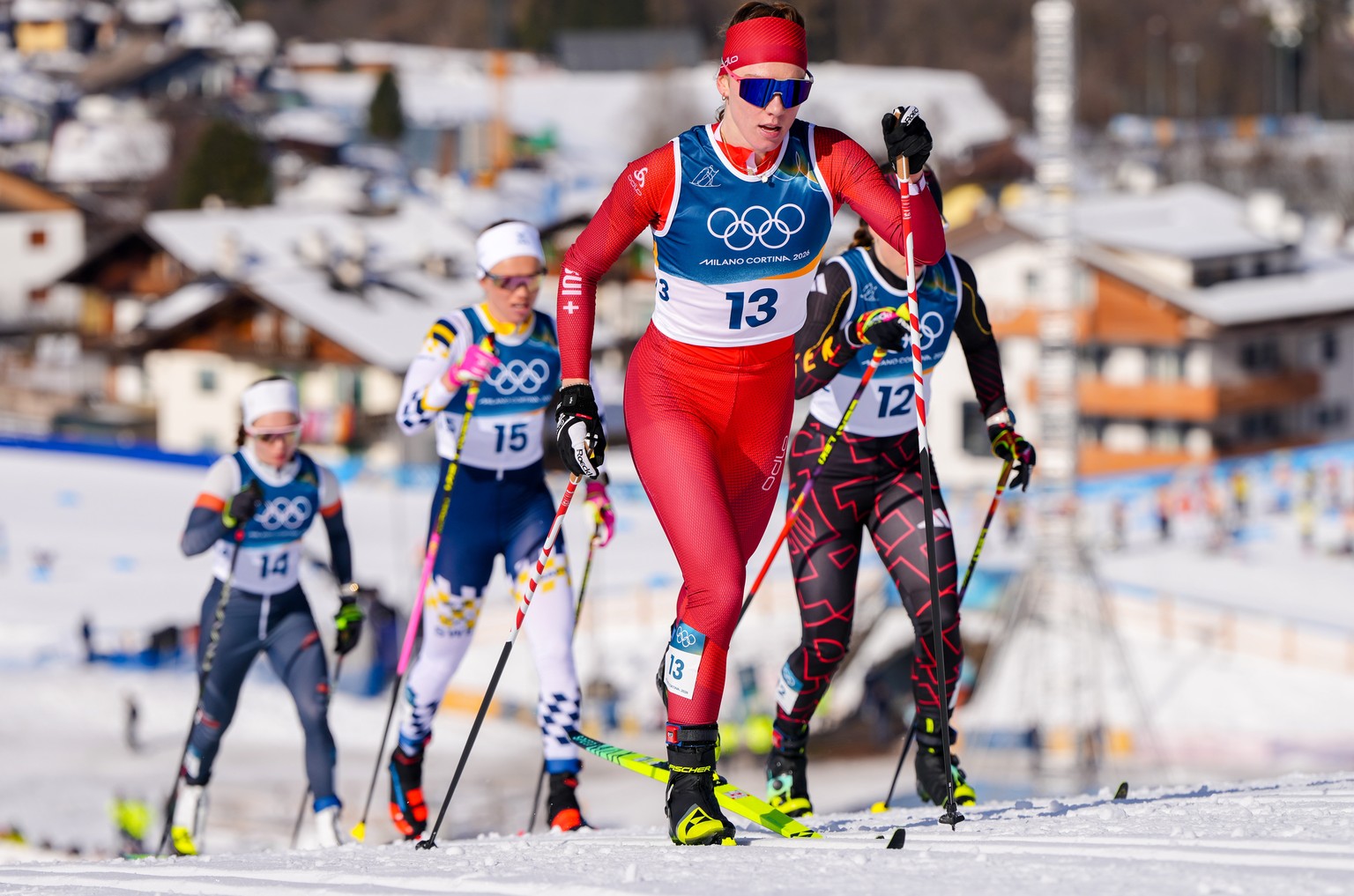 Nadja Kaelin, of Switzerland, competes in the cross country skiing women's 50km mass start classic at the 2026 Winter Olympics, in Tesero, Italy, Sunday, Feb. 22, 2026. (AP Photo/Kirsty Wiggleswo ...