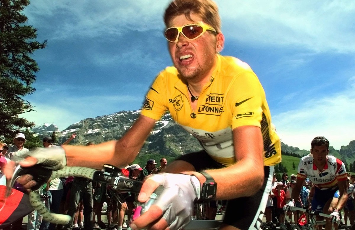 Overall leader Jan Ullrich of Germany strains as he climbs the La Croix pass during the 16th stage of the Tour de France cycling race between Morzine in the French Alps and Fribourg, Switzerland, Tues ...