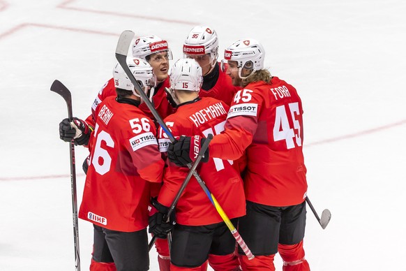 KEYPIX - Switzerland&#039;s forward Gregory Hofmann #15 celebrates his goal with his teammates Switzerland&#039;s defender Tim Berni #56, Switzerland&#039;s forward Simon Knak #8, Switzerland&#039;s f ...