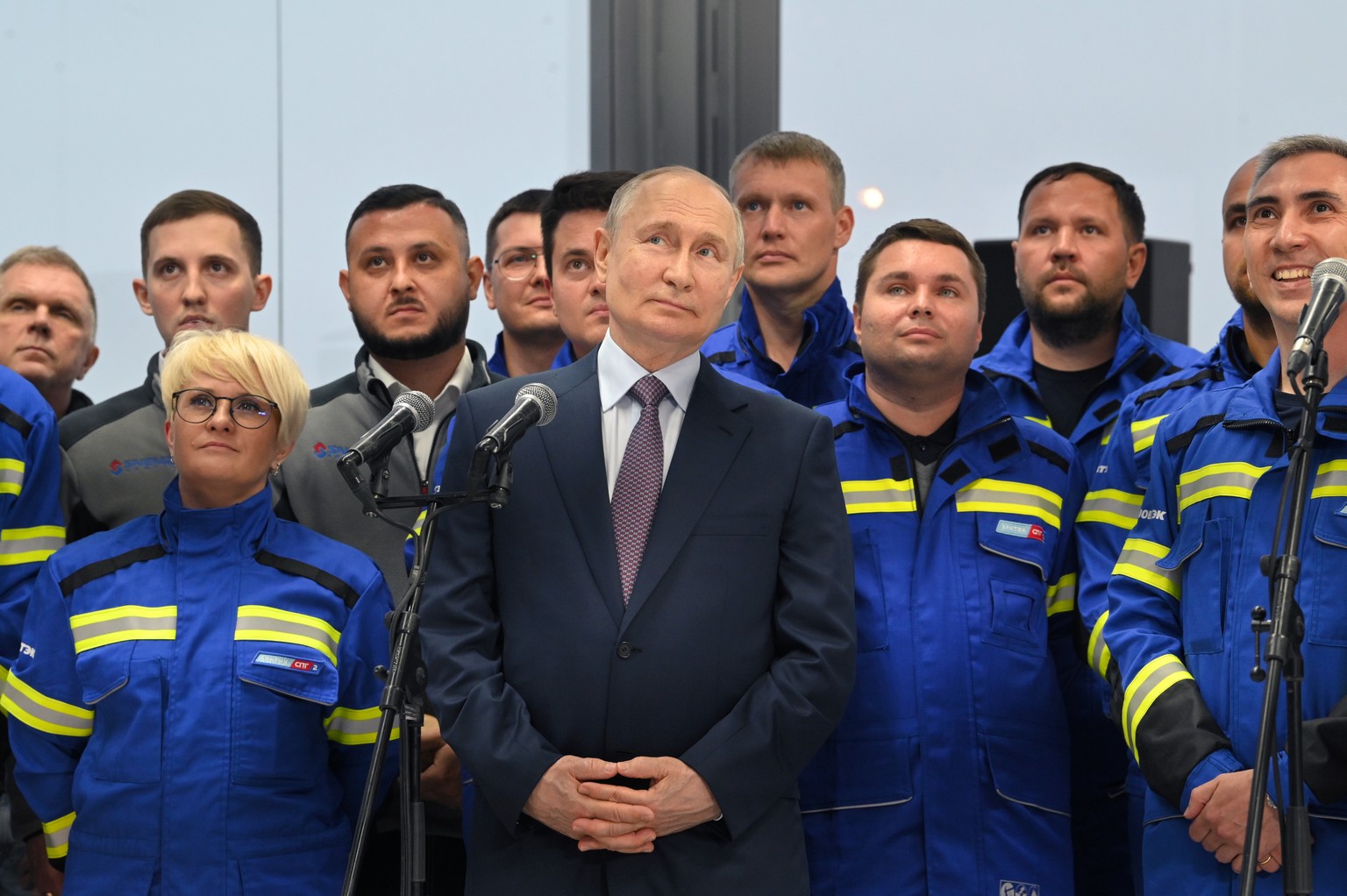 epa10758803 Russian President Vladimir Putin (C) attends a ceremony to pilot the first liquefied natural gas (LNG) production line using gravity-based structures as part of the Arctic LNG 2 project on…