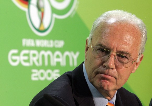 FILE - In this file photo from June 29, 2006, Franz Beckenbauer, then chairman of the German organizing committee of the World Cup, informs the media during a press conference at the Olympic Stadium ...