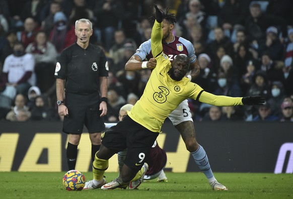 Aston Villa&#039;s Tyrone Mings challenges for the ball with Chelsea&#039;s Romelu Lukaku, front, during the English Premier League soccer match between Aston Villa and Chelsea at Villa Park in Birmin ...