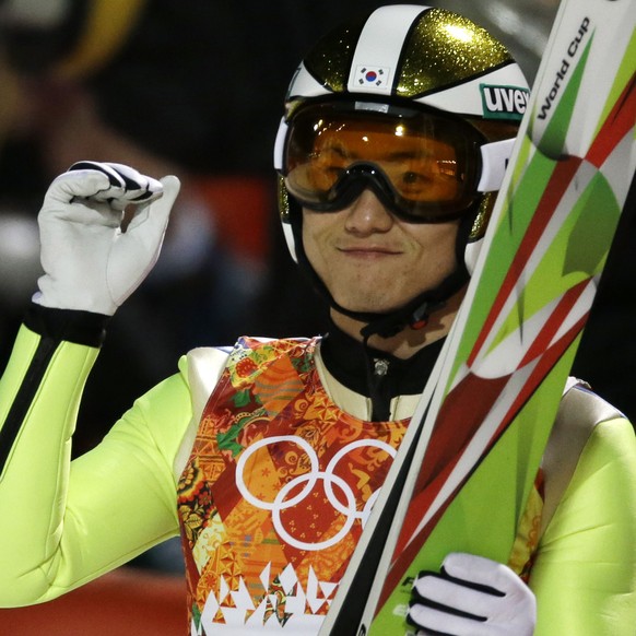 South Korea&#039;s Choi Seou smiles after his first attempt during the men&#039;s normal hill ski jumping final at the 2014 Winter Olympics, Sunday, Feb. 9, 2014, in Krasnaya Polyana, Russia. (AP Phot ...