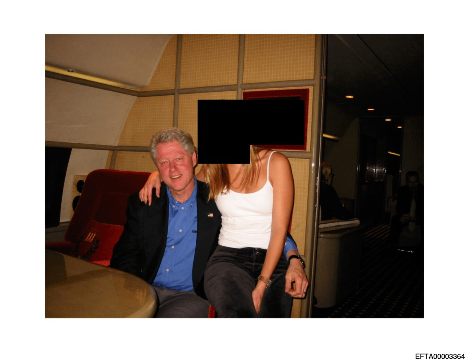 This undated, redacted photo released by the U.S. Department of Justice shows former President Bill Clinton with an unknown person. (U.S. Department of Justice via AP)
Justice Department Jeffrey Epste ...