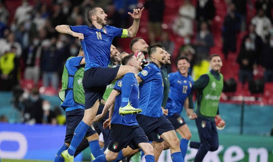 Italy&#039;s players celebrates after winning the Euro 2020 soccer championship round of 16 match between Italy and Austria at Wembley stadium in London, Saturday, June 26, 2021. (AP Photo/Frank Augst ...