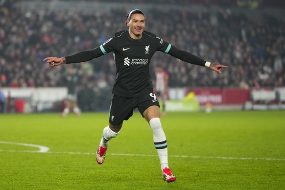 Liverpool&#039;s Darwin Nunez celebrates after scoring his side&#039;s second goal during the English Premier League soccer match between Brentford and Liverpool at the GTech Community Stadium in Lond ...