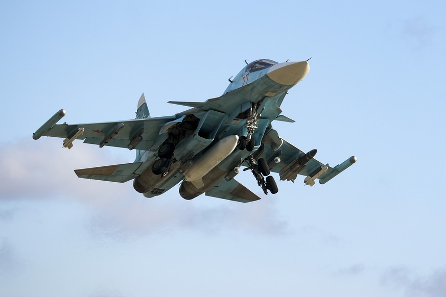 FILE - A Russian Su-34 bomber takes off for a training mission in Krasnodar Region, Russia, Wednesday, Jan. 19, 2022. With tens of thousands of Russian troops positioned near Ukraine, the Kremlin has  ...