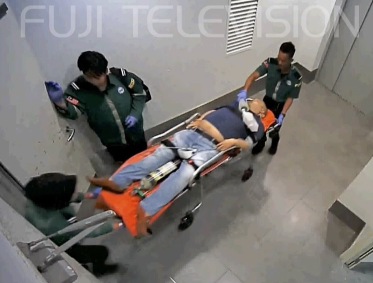 In this image made from Feb. 13, 2017, video provided by Fuji TV, Kim Jong Nam, half-brother of North Korean leader Kim Jong Un, is stretchered at Kuala Lumpur International Airport in Sepang, Malaysi ...