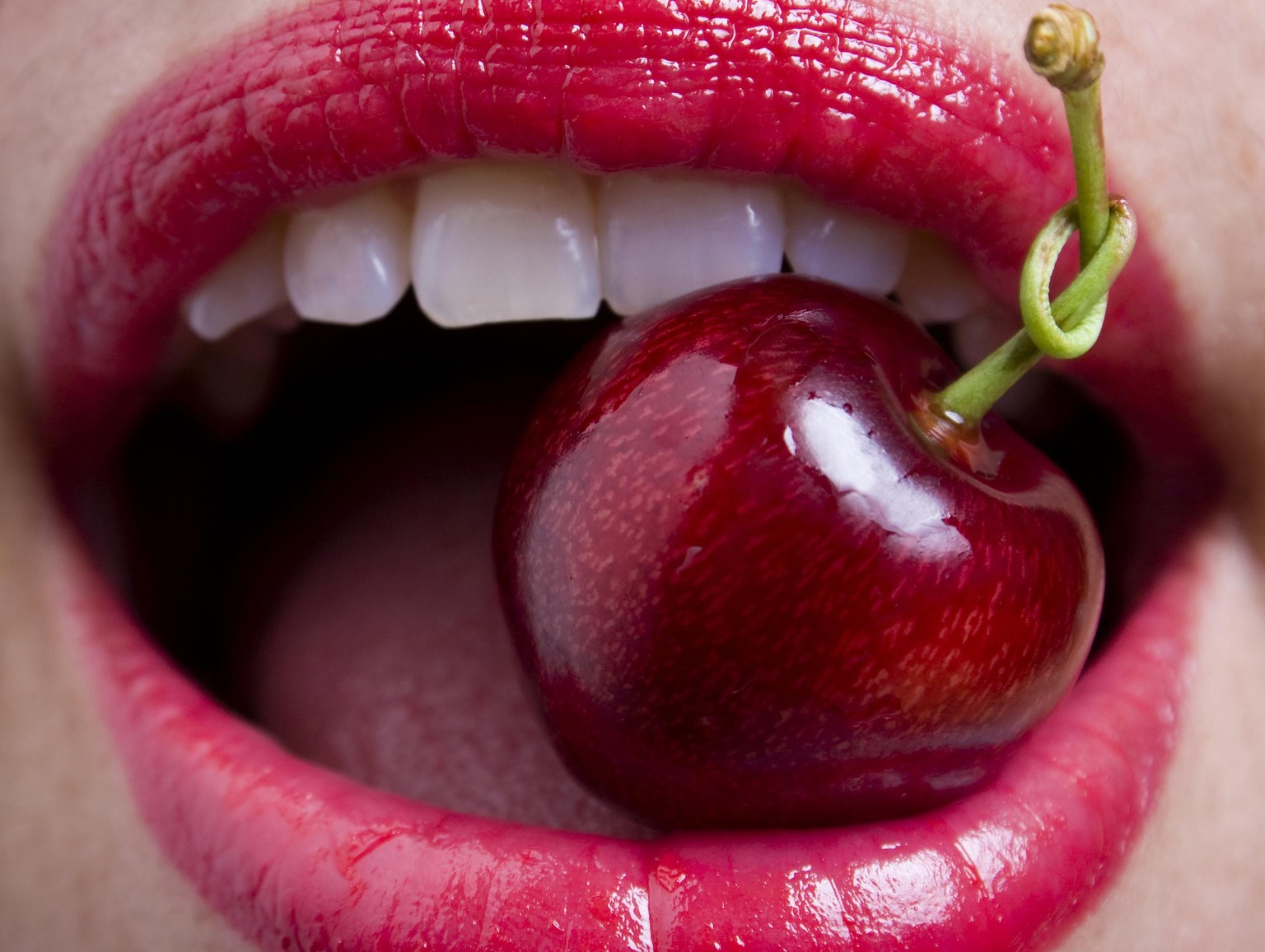 &quot;Luscious red lips and a cherry, its stem tongue-tied into a perfect knot . . .&quot;