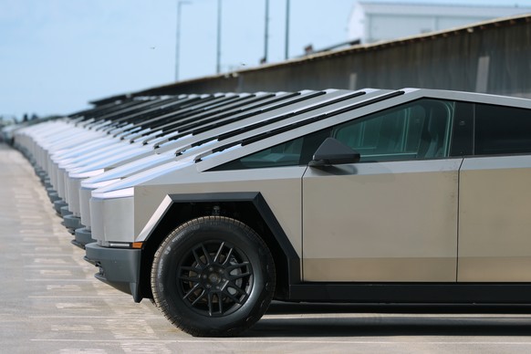 FILE - New Tesla Cybertrucks are seen at SpaceX's Starship facility in Starbase, Texas, Monday, Oct. 13, 2025. (AP Photo/Eric Gay, File)
SpaceX IPO