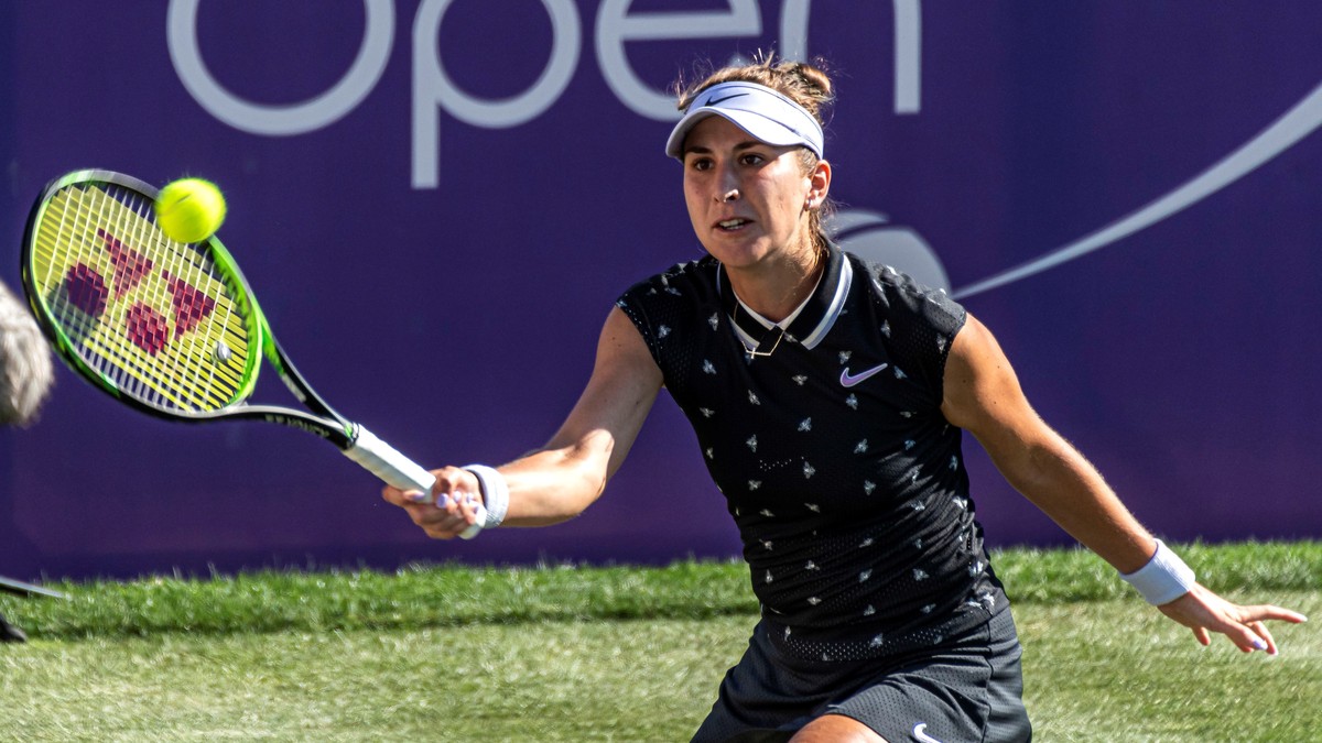 epa07654310 Swiss tennis player Belinda Bencic returns the ball during her WTA Mallorca Open round 32 match against Swedish Rebecca Peterson at Santa Ponsa's Club in Mallorca, Balearic Islands, S ...