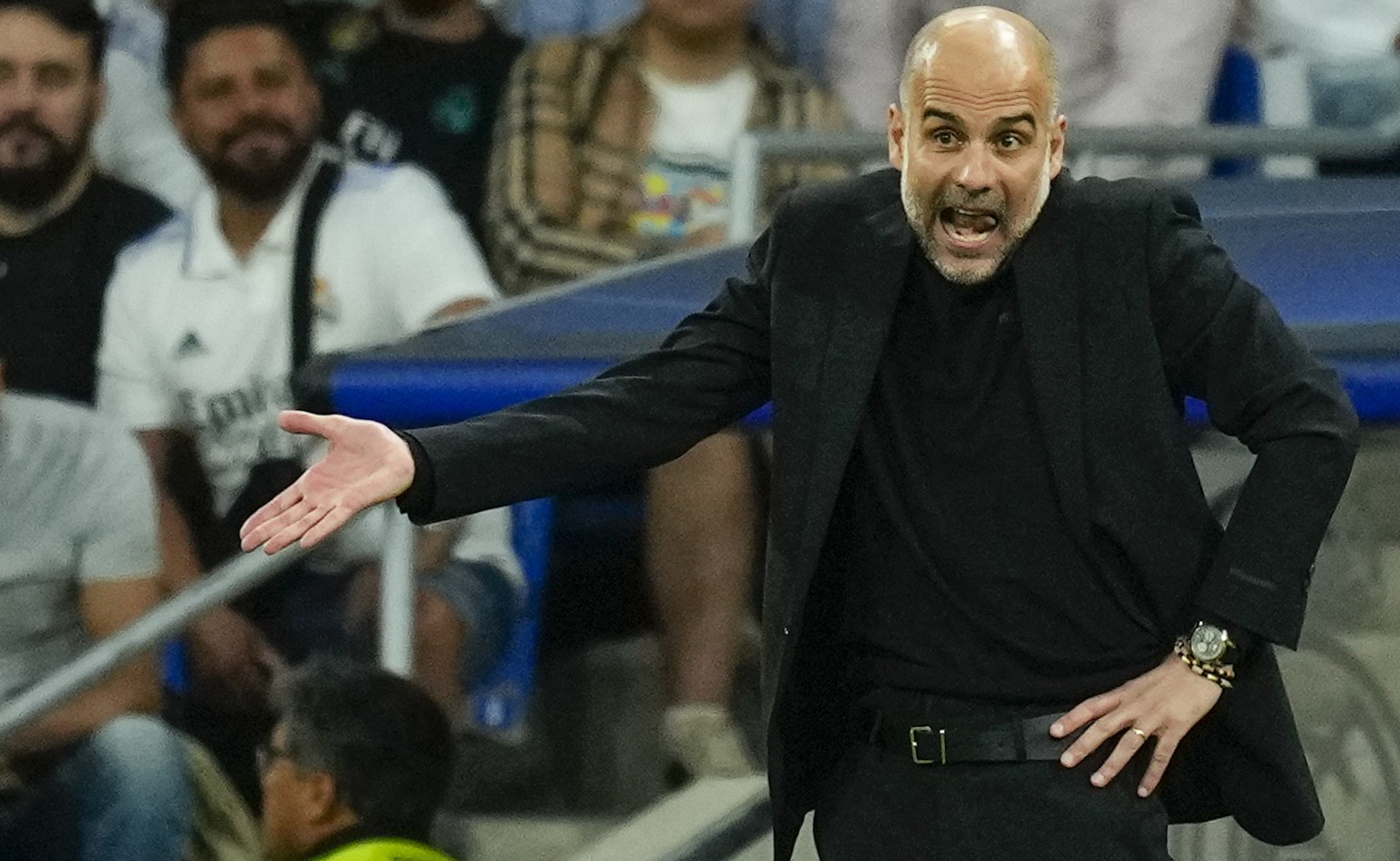 Manchester City&#039;s head coach Pep Guardiola gives instructions to his players during the Champions League semifinal first leg soccer match between Real Madrid and Manchester City at the Santiago B ...