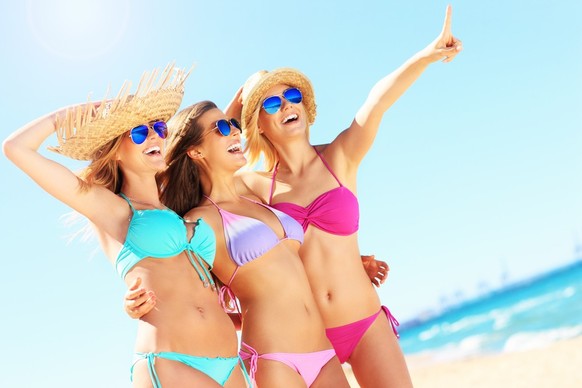 Women have fun on the beach