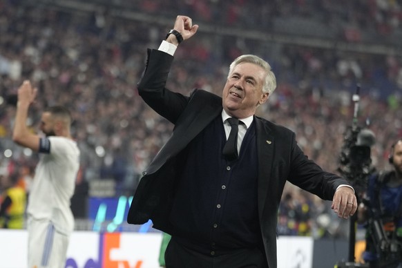 Real Madrid&#039;s head coach Carlo Ancelotti celebrates winning the Champions League final soccer match between Liverpool and Real Madrid at the Stade de France in Saint Denis near Paris, Saturday, M ...