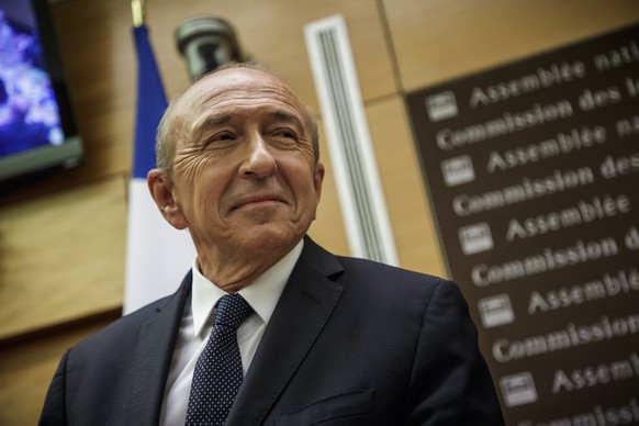 epa06905745 French Interior Minister Gerard Collomb prepares to face the deputies of the Laws Commission during his hearing concerning the scandal of President Macron's security chief Alexandre Benall ...