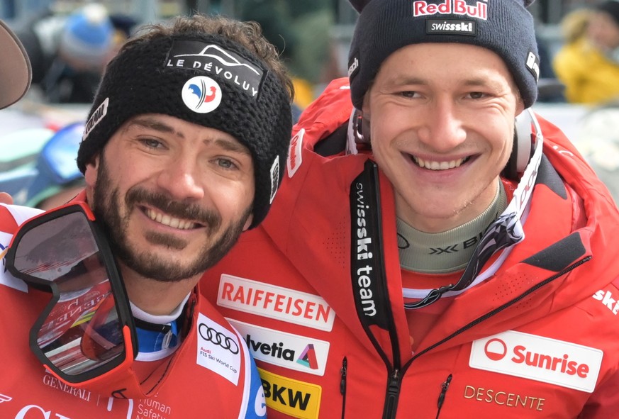 epa11089603 (L-R) Florian Schieder of Italy, Cyprien Sarrazin of France and Marco Odermatt of Switzerland pose in the finish area during the Men&#039;s Downhill race at the FIS Alpine Skiing World Cup ...