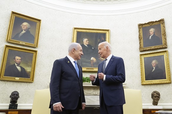 FILE - President Joe Biden, right, talks with Israeli Prime Minister Benjamin Netanyahu, left, in the Oval Office of the White House in Washington, July 25, 2024. U.S. officials say the Biden administ ...