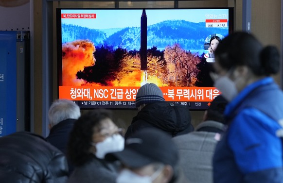 People watch a TV showing a file image of North Korea&#039;s missile launch during a news program at the Seoul Railway Station in Seoul, South Korea, Sunday, Feb. 27, 2022. North Korea on Sunday launc ...