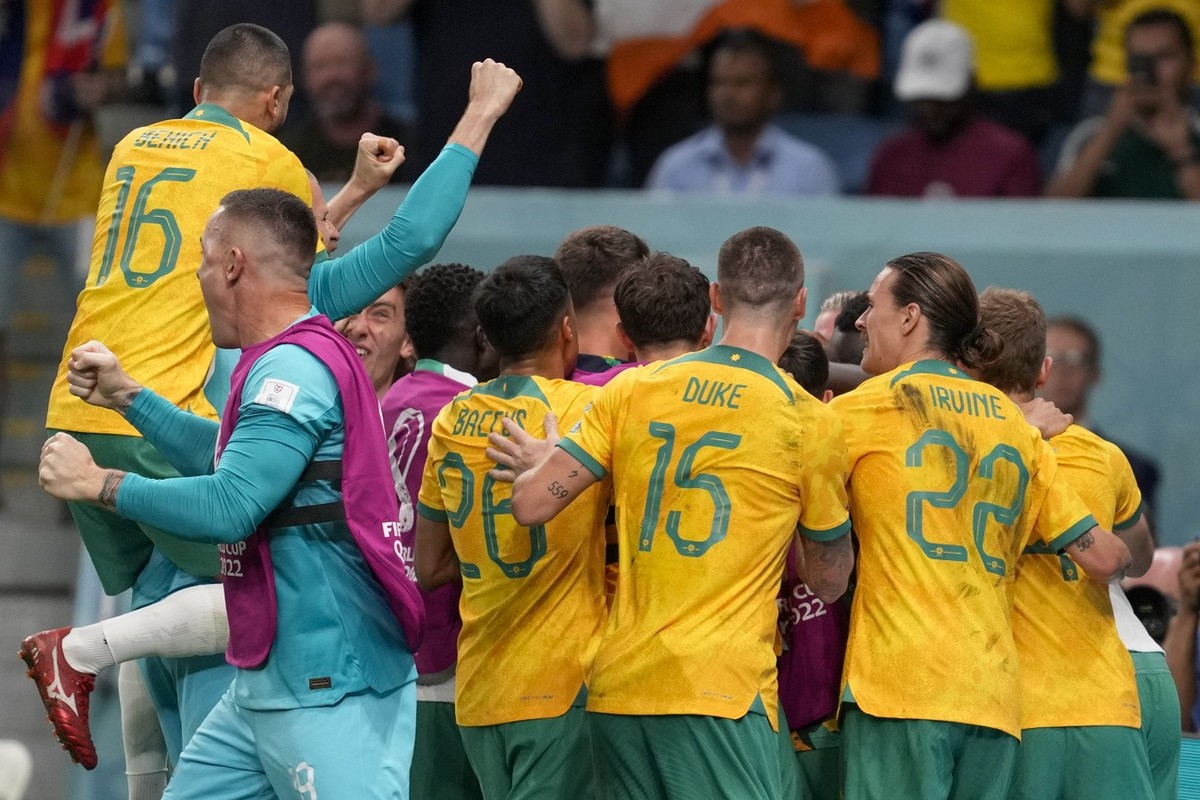Australia's soccer team their side's first goal during the World Cup group D soccer match between Australia and Denmark, at the Al Janoub Stadium in Al Wakrah, Qatar, Wednesday, Nov. 30, 202 ...