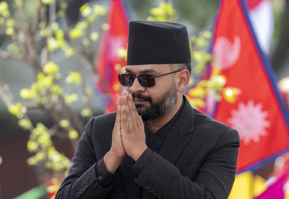 epa12853548 Newly elected Prime Minister of Nepal Balendra Shah reacts during an oath-taking ceremony at the presidential office in Kathmandu, Nepal, 27 March 2026. The former mayor and senior leader  ...