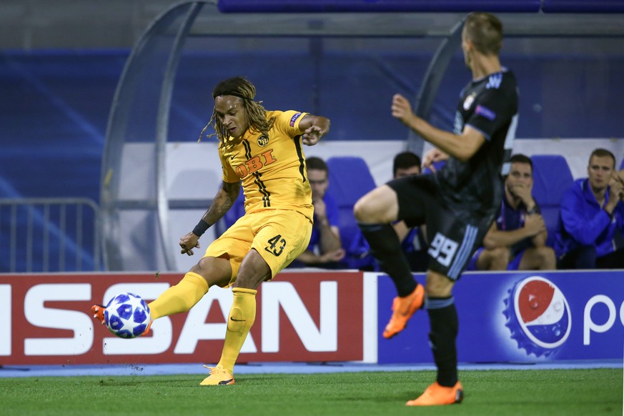 YB&#039;s Kevin Mbabu, left, kicks the ball next to Zagreb&#039;s Mislav Orsic, during the UEFA Champions League football 2nd leg playoff match between GNK Dinamo Zagreb from Croatia and BSC Young Boy ...