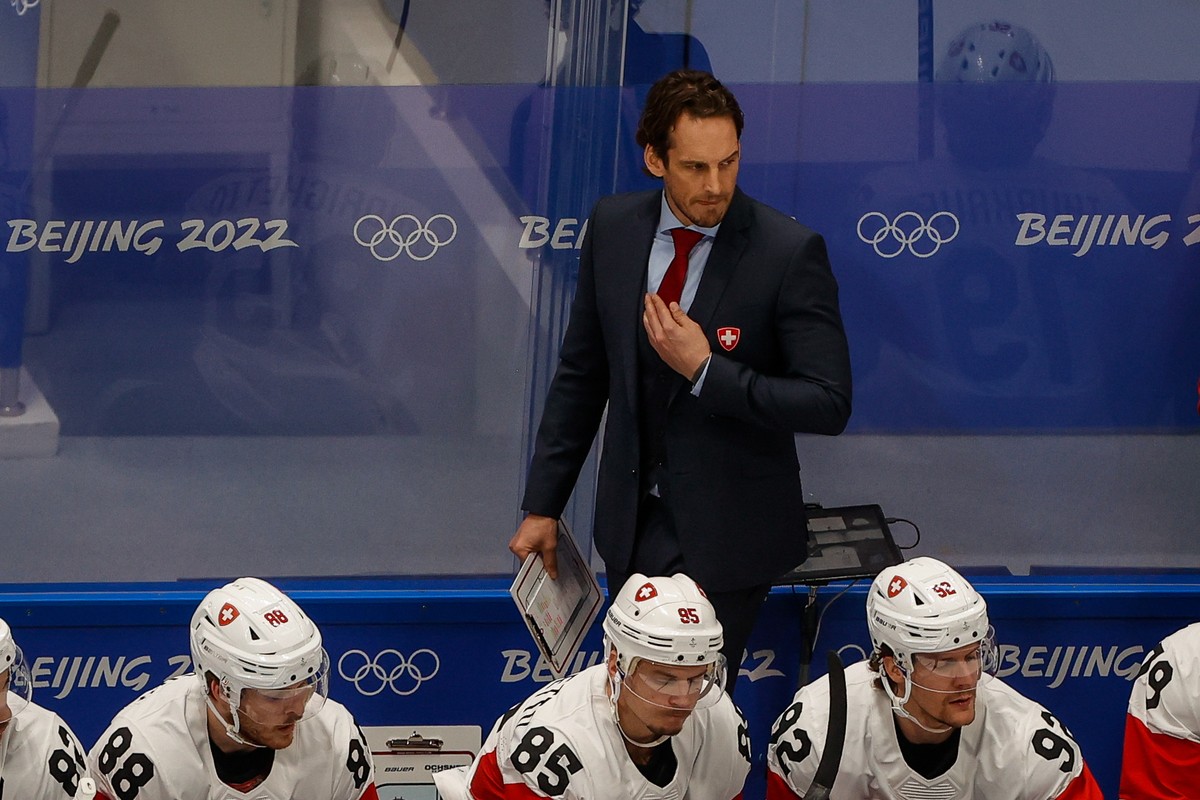 epa09740582 Switzerland's head coach Patrick Fischer reacts during the Men's Ice Hockey preliminary round match between Russia and Switzerland at the Beijing 2022 Olympic Games, Beijing, Chi ...