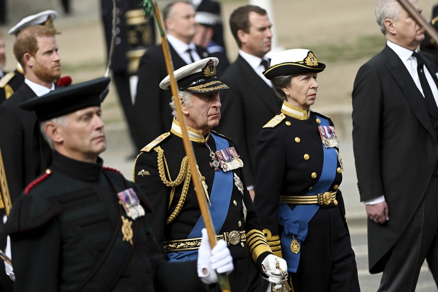 King Charles III and Princess Royal Anne follow the procession of the state funeral of Queen Elizabeth II Monday, Sept. 19, 2022. The Queen, who died aged 96 on Sept. 8, will be buried in the George V ...