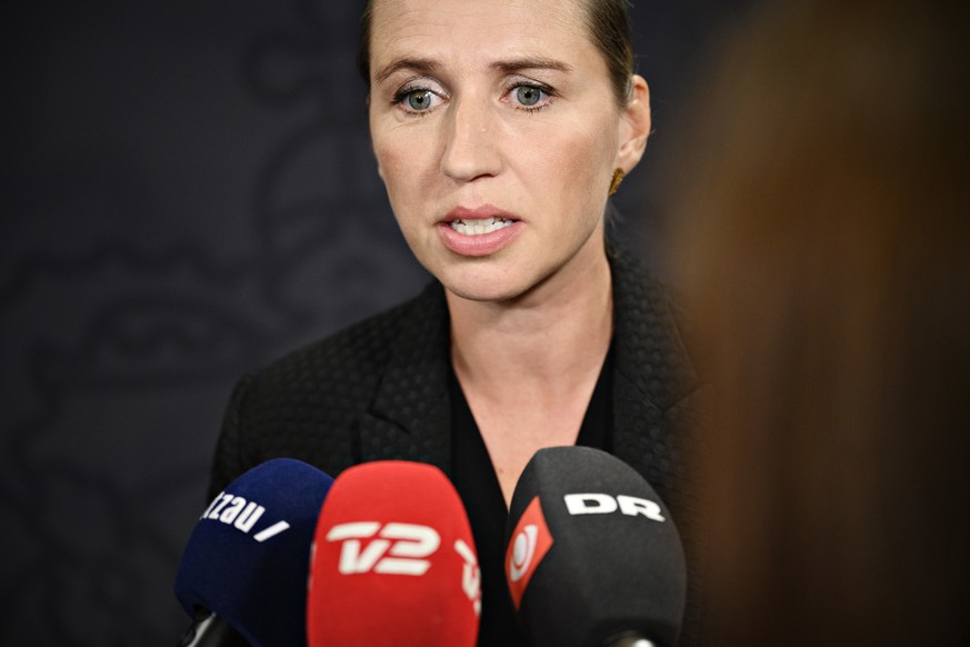 epa07760138 Danish Prime Minister Mette Frederiksen holds press briefing on explosion at the Tax Agency, in the Mirror Hall at Christiansborg, Copenhagen, Denmark, 07 August 2019. One person was repor ...