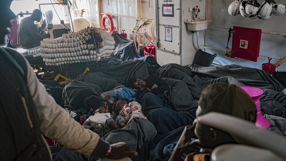 Migrants on the deck of the Rise Above rescue ship run by the German organization Mission Lifeline, in the Mediterranean Sea off the coasts of Sicily, southern Italy, Saturday, Nov. 5, 2022. Italy all ...
