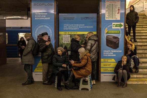 epa10368251 People shelter in a subway station during a air raid alert in downtown Kyiv (Kiev), Ukraine, 16 December 2022. A wave of Russian missile attacks on 16 December targeted the Ukrainian capit ...