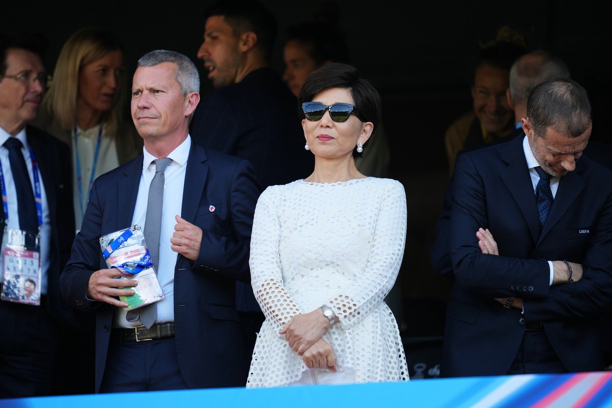 Michele Kang, owner of OL Lyonnes, stands on the tribune next to UEFA President Aleksander Ceferin, right, during the Women's Champions League final soccer match between FC Barcelona and OL Lyonn ...