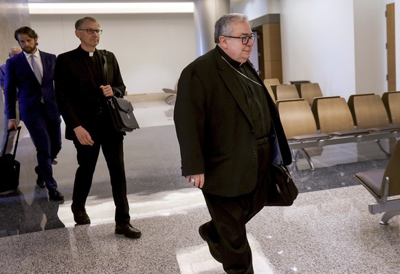 Bishop Micheal Olson enters the 67th District Court in the Tom Vandergriff Civil Courts Building, Tuesday, June 27, 2023, in downtown Fort Worth, Texas. Reverend Mother Teresa Agnes Gerlach is suing O ...