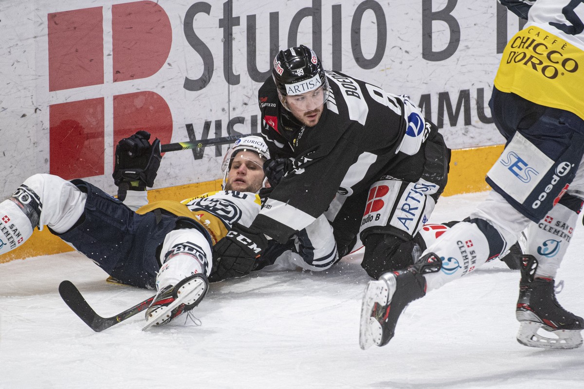 Lugano's player Mikkel Boedker, on top, during the preliminary round game of National League (NLA) Swiss Championship 2020/21 between HC Lugano against HC Ambri-Piotta at the ice stadium Corner A ...