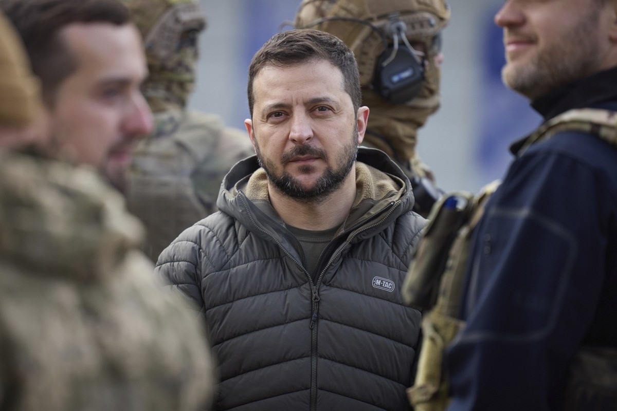In this photo provided by the Ukrainian Presidential Press Office and posted on Facebook, Ukrainian President Volodymyr Zelenskyy seen during his visit to Kherson, Ukraine, Monday, Nov. 14, 2022. (Ukr ...
