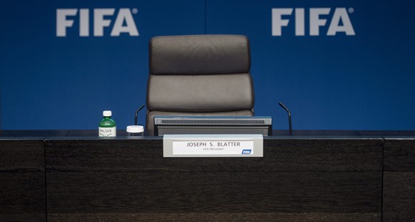 epa04780698 The empty chair of FIFA president Joseph S. Blatter is pictured prior to a press conference at the FIFA headquarters in Zurich, Switzerland, 02 June 2015. FIFA president Joseph S. Blatter  ...