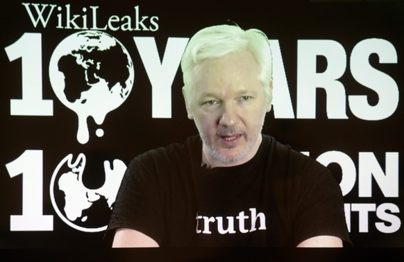 epaselect epa05569386 Wikileaks founder Julian Assange in a live video link at a press conference on the 10th anniversary of Wikileaks, in Berlin, Germany, 04 October 2016. Assange, appeared via video ...