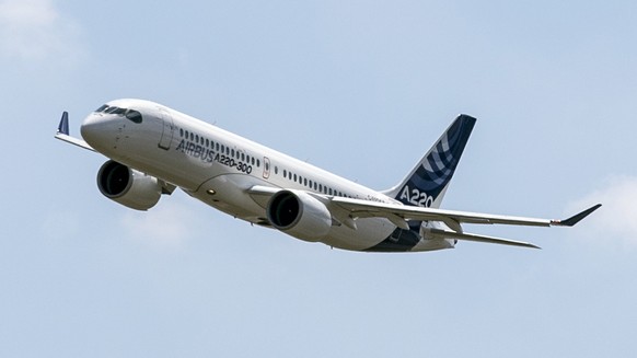 An Airbus A220 lands at Toulouse-Blagnac airport, southwestern France, Tuesday, July 10, 2018. Airbus unveiled its new A220 aircraft Tuesday, with an A220-300 landing in the southwestern French town o ...