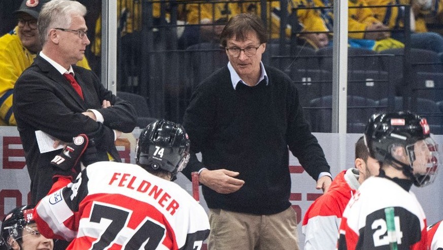 IMAGO / Bildbyran

220514 Head coach Roger Bader and assistant coach Arno Del Curto of Austria during the 2022 IIHF Ice hockey, Eishockey World Championship, WM, Weltmeisterschaft game between Sweden  ...