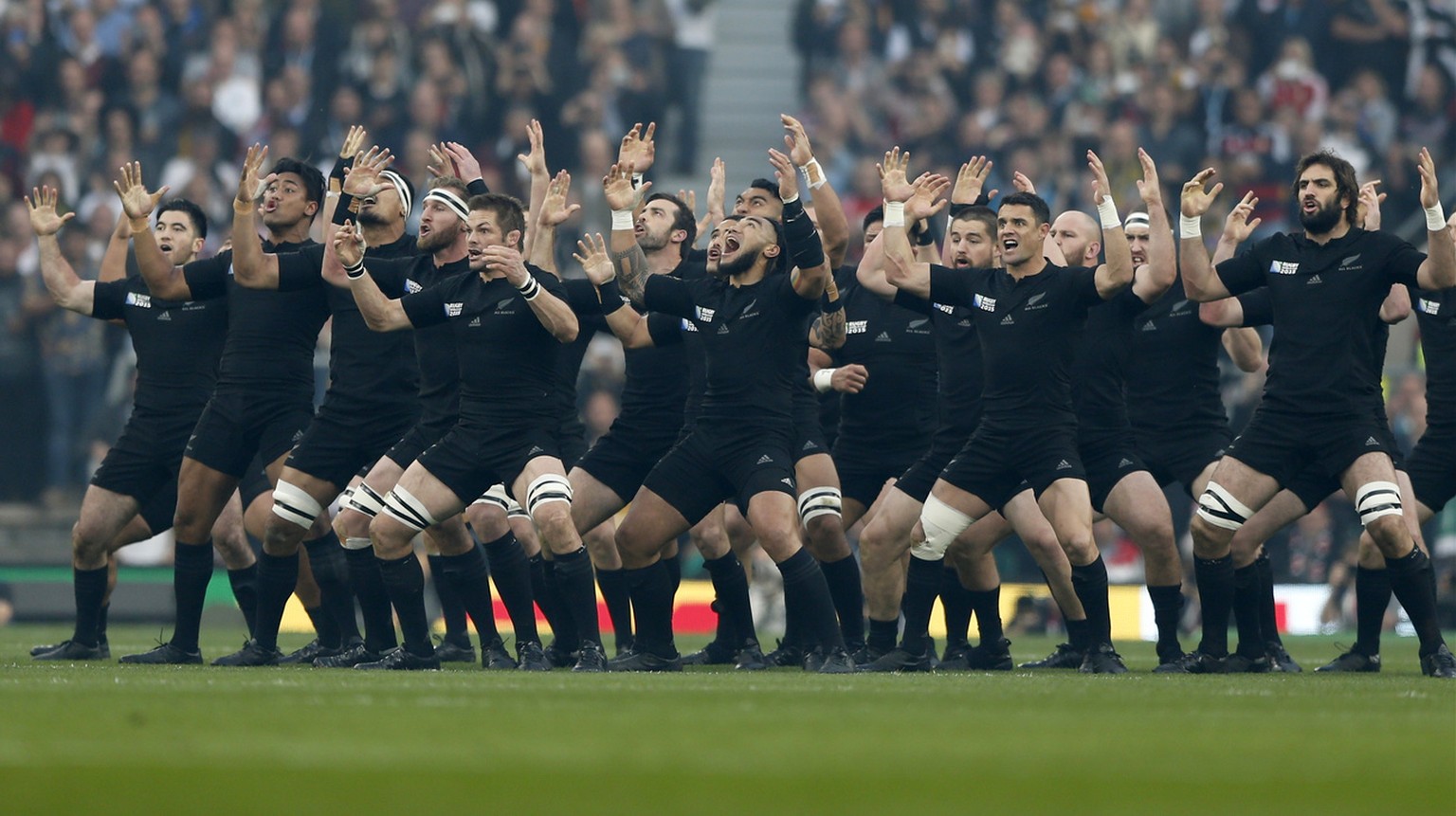 New Zealand players perform the haka before the Rugby World Cup final between New Zealand and Australia at Twickenham Stadium, London, Saturday, Oct. 31, 2015. (AP Photo/Frank Augstein)