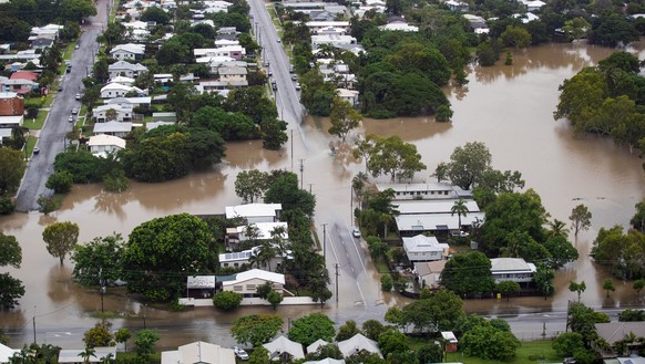 epa07341865 An aerial view of flood waters in the suburb of Hyde Park, Townsville, Queensland, Australia, 04 February 2019. Hundreds of people still waiting for help and evacuation centers are filling ...